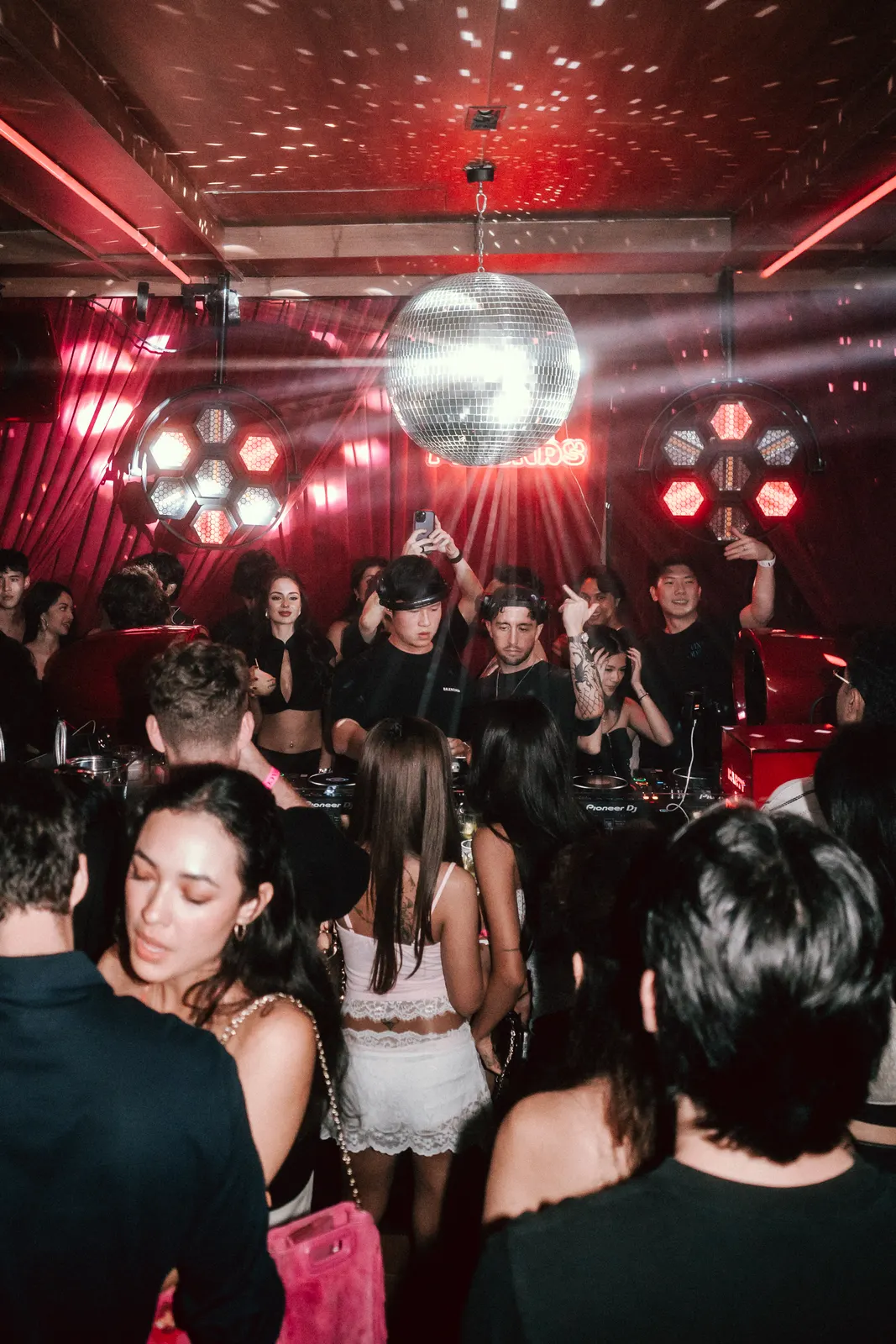 SUBSHIFT playing beneath a disco ball